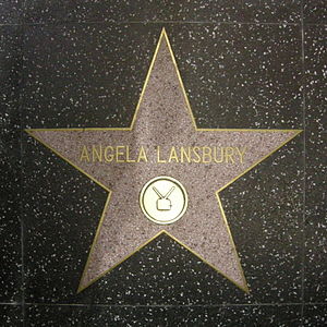 A five-point star set in the ground; the name "Angela Lansbury" is written in the centre of it in gold lettering