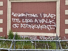 Graffiti quoting Bousbaa on Hungerford Bridge, London. "Every time I rap it's like a walk of atonement" graffiti, Hungerford Bridge.jpg