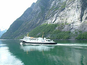 The sight-seeing boat making a trip through the fjord