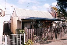 1412 - Timber Slab Cottage - Exterior of 44 Barden Street, Tempe; original cottage cacooned with modern aluminium weatherboards. (5049609b1).jpg