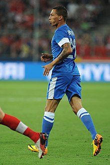 Holebas playing for Greece against Austria in 2013
