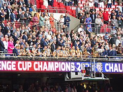 Leigh Leopards players making their way across Wembley's Royal Balcony to collect their 2023 Challenge Cup winners awards.