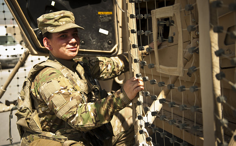 File:455th ESFS airman getting in MATV.jpg