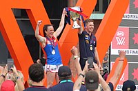 AFLW S7 GF Pearce and Stinear hold up cup.jpg