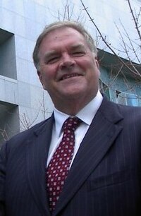 Beazley, then serving as Shadow Minister for Defence, outside Parliament House, Canberra, July 2004 Ac.kimbeazleynew (cropped).jpg