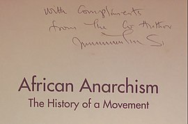 A copy of African Anarchism inscribed by Sam Mbah: "With Compliments from the Co Author" African Anarchism signed by Sam Mbah.jpg