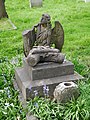 Broken gravestones outside All Saints' Church in Orpington.