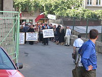 Protesters in Tbilisi with flag of the Democratic Republic of Georgia blocking the way from the Open Society Institute office, 2005 Anti-Soros demonstrations (Tbilisi Sep 28, 2005).jpg