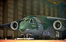 KC-390 is the largest military transport aircraft produced in South America by the Brazilian company Embraer. Apresentacao KC-390 (15414135738).jpg