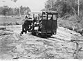 Australian soldiers jump start a narrow gauge locomotive in Seria, Borneo.JPG