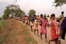 A protest walk by Baigas, the Particularly vulnerable tribe of Chhattisgarh. Baiga adivasi in protest walk, India.jpg