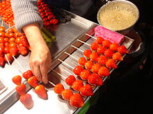 Tanghulu is a traditional Chinese snack of candied fruit Bingtanghulu.JPG