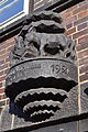 Deutsch: Fassadenschmuck am Brahmskontors in Hamburg-Neustadt. This is a photograph of an architectural monument. It is on the list of cultural monuments of Hamburg, no. 29190.