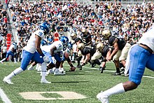 Buffalo lines up on offense before a snap during a 2017 game against Army Buffalo vs. Army (36730995260).jpg