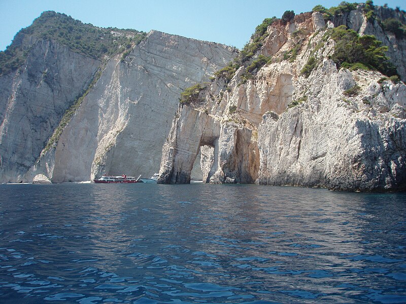 File:Cliff-walled beach and cliff underpass, Marathia cape, Zakynthos, Greece 01.jpg