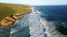 Línia de costa a Keurboomstrand, Plettenberg Bay, Sud Àfrica