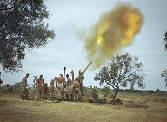 A British 4.5-inch gun firing in Tunisia, 1943. Collaboration of Royal Air Force Spitfires and the Eighth Army, Tunisia, Spring 1943 TR1004.jpg