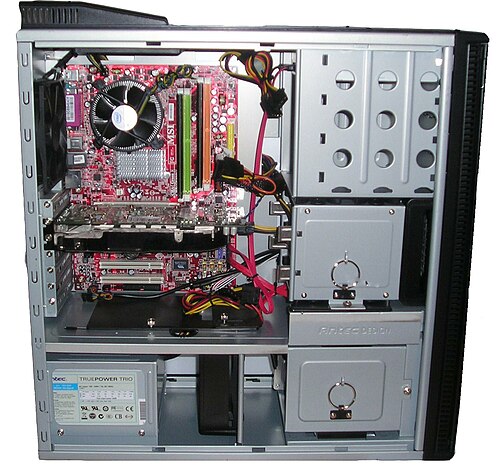 Inside a custom-built computer: power supply at the bottom has its own cooling fan