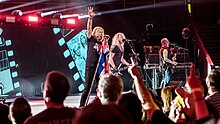 Def Leppard performing at a charity concert for the Teenage Cancer Trust held at the Royal Albert Hall in 2018.