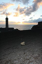 Between 1957 and 1958 a volcanic eruption caused the abandon of the lighthouse and the destruction of surrounding buildings Farol dos Capelinhos2.jpg