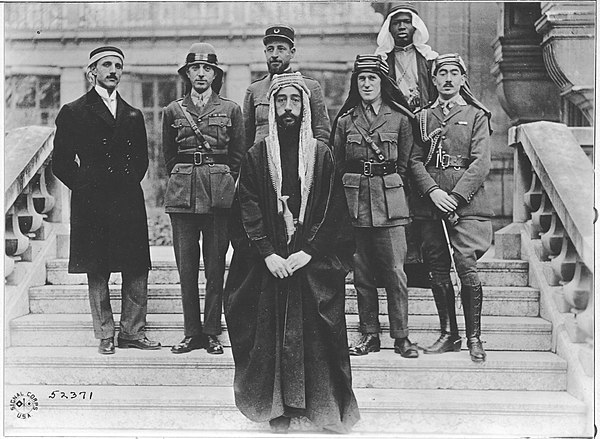 Emir Faisal's party at Versailles, during the Paris Peace Conference of 1919. At the centre, from left to right: Rustum Haidar, Nuri as-Said, Prince F