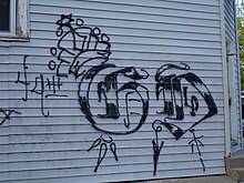 Graffiti piece by the West 49th Street & South Honore Street set of the Gangster Disciple Nation on West 50th Street and South Hermitage Avenue, Chicago IL. Gangster disciples chicago.jpg