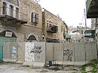 Scheidingsmuur in Hebron tussen zone H1 en H2 met opschrift "Dood aan de Arabieren", 2007