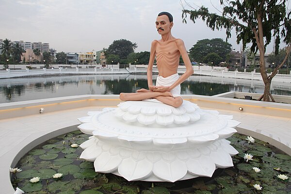 A life-size statue of Shrimad Rajchandra has been consecrated on a white lotus at the center of the lake and walking track has been constructed for th