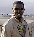 Jamie Foxx poses near an F/A-18F Super Hornet after arriving on board Naval Air Station North Island July 17, 2005 (cropped)