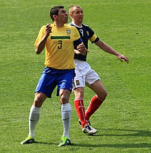 Lúcio playing for Brazil in 2011