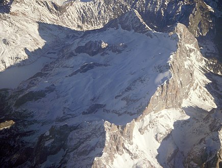 Marmolada massif with summit Gran Vernel, the glacier and lake Fedaia (in left side, photo).