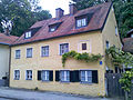 Two-storey saddle roof house