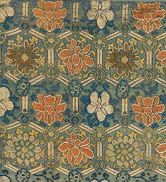 Detail of a Ming Dynasty brocade, using a chamfered hexagonal lattice pattern