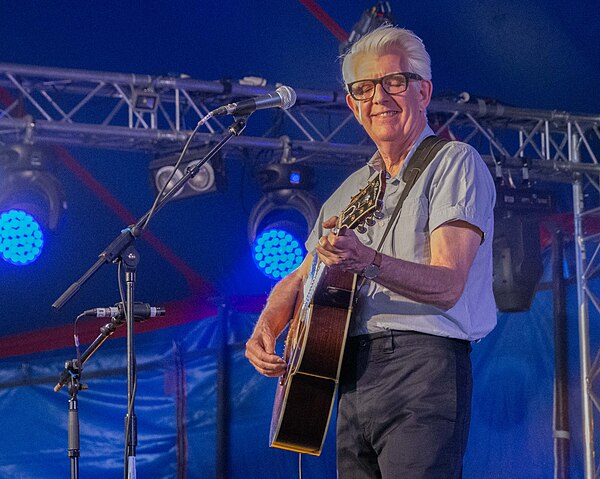 Lowe performing at the Ealing Blues Festival in 2019