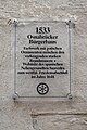 Informationstafel am Wohn- und Geschäftshaus "Haus Läer" Krahnstraße 4/Ecke Marienstraße