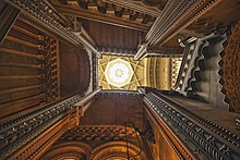 A view up to the lantern at the apex of the Grand Staircase Penrhyn Castle Staircase (135895987).jpeg