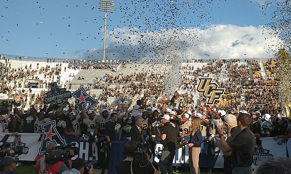 UCF celebrates their victory over Memphis in the AAC Championship Game.