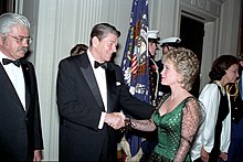 President Ronald Reagan shaking hands with singer Barbara Mandrell.jpg