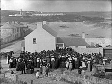 Public meeting involving mining company staff held in Bonmahon in 1906 Public meeting about Bonmahon Copper Mines Ireland 1900s (5866020082).jpg