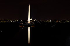 The Washington Monument is seen in full in the Reflecting Pool, from the roof of the Lincoln Memorial. (June 2010)