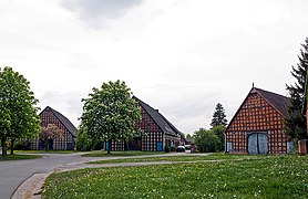 Vierständerhallenhäuser im Rundling