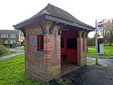 Brick bus shelter.