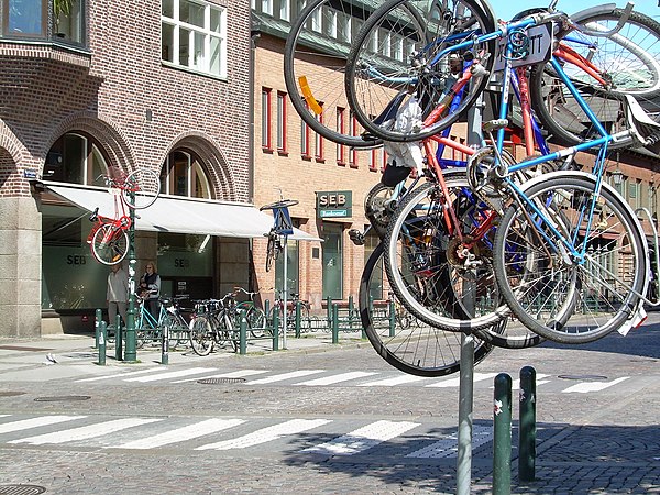 Bicycles hanging high as the result of a student prank in Lund, Sweden