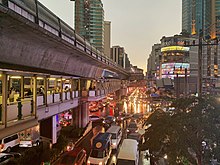 Traffic jams, seen here on Sukhumvit Road, are common in Bangkok. Sukhumwit Road with BTS Asok and Asok Montri Rd.jpg