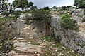 Ruin of old Synagogue walls carved from the rock at Kafr 'Inan