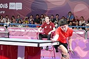 Deutsch: Tischtennis bei den Olympischen Jugendspielen 2018; Tag 9, 15. Oktober 2018; Mixed, Finale, Mixed-Doppel – Tomokazu Harimoto (JPN) Vs Wang Chuqin (CHN) 3:1 English: Table tennis at the 2018 Summer Youth Olympics at 15 October 2018 – Mixed Final, Mixed-Double – Tomokazu Harimoto (JPN) Vs Wang Chuqin (CHN) 3:1