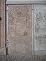 Gravestone on the wall of the church of S.Marco