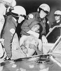 Police violence during the Watts Uprising (August 1965) Wattsriots-policearrest-loc.jpg