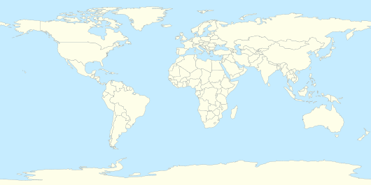 Mapa konturowa świata, blisko prawej krawiędzi nieco na dole znajduje się punkt z opisem „Sydney”, natomiast u góry po prawej znajduje się punkt z opisem „Seul”