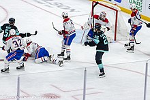 Wright (left) scoring his first NHL goal against the Montreal Canadiens. Wright first goal 12 6 - 52549551450.jpg